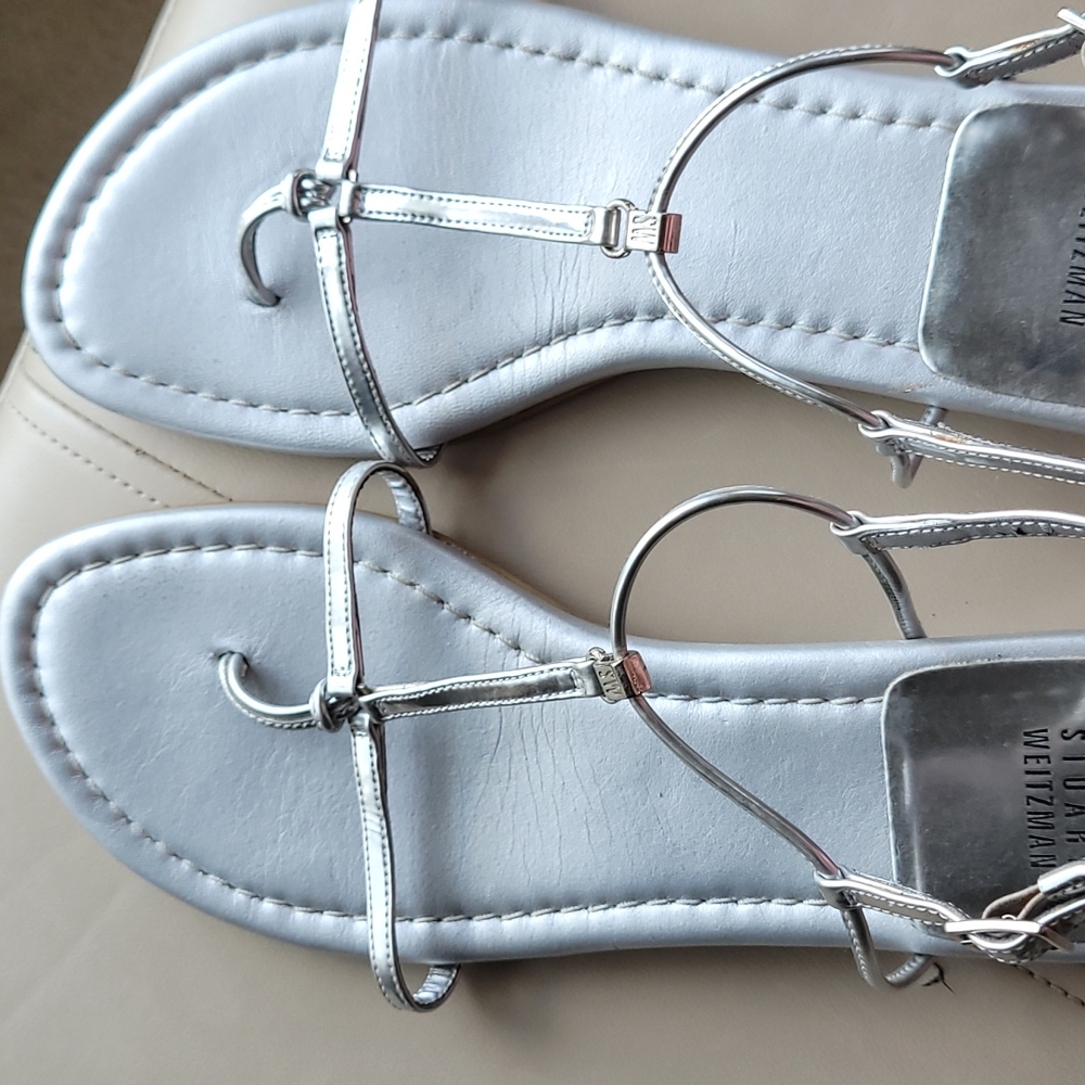 Stuart Weitzman silver sandal. Size 9. Low heel. Great condition.